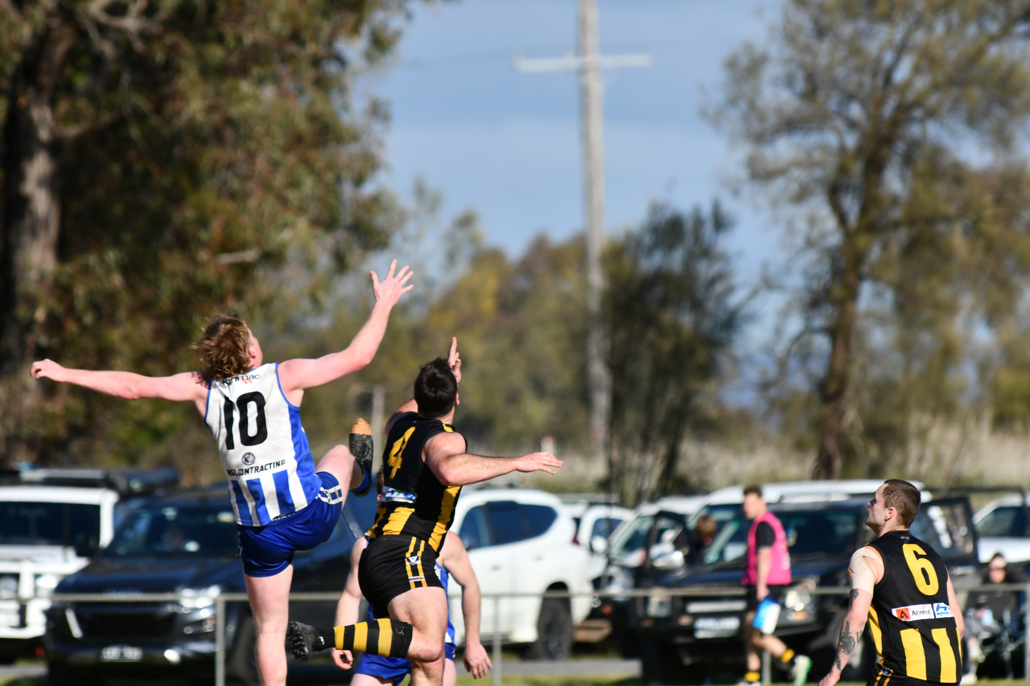 Noah Hildebrand and Matt Healy jump for the bounce in Saturday's qualifying final between Harrow Balmoral and Pimpinio.