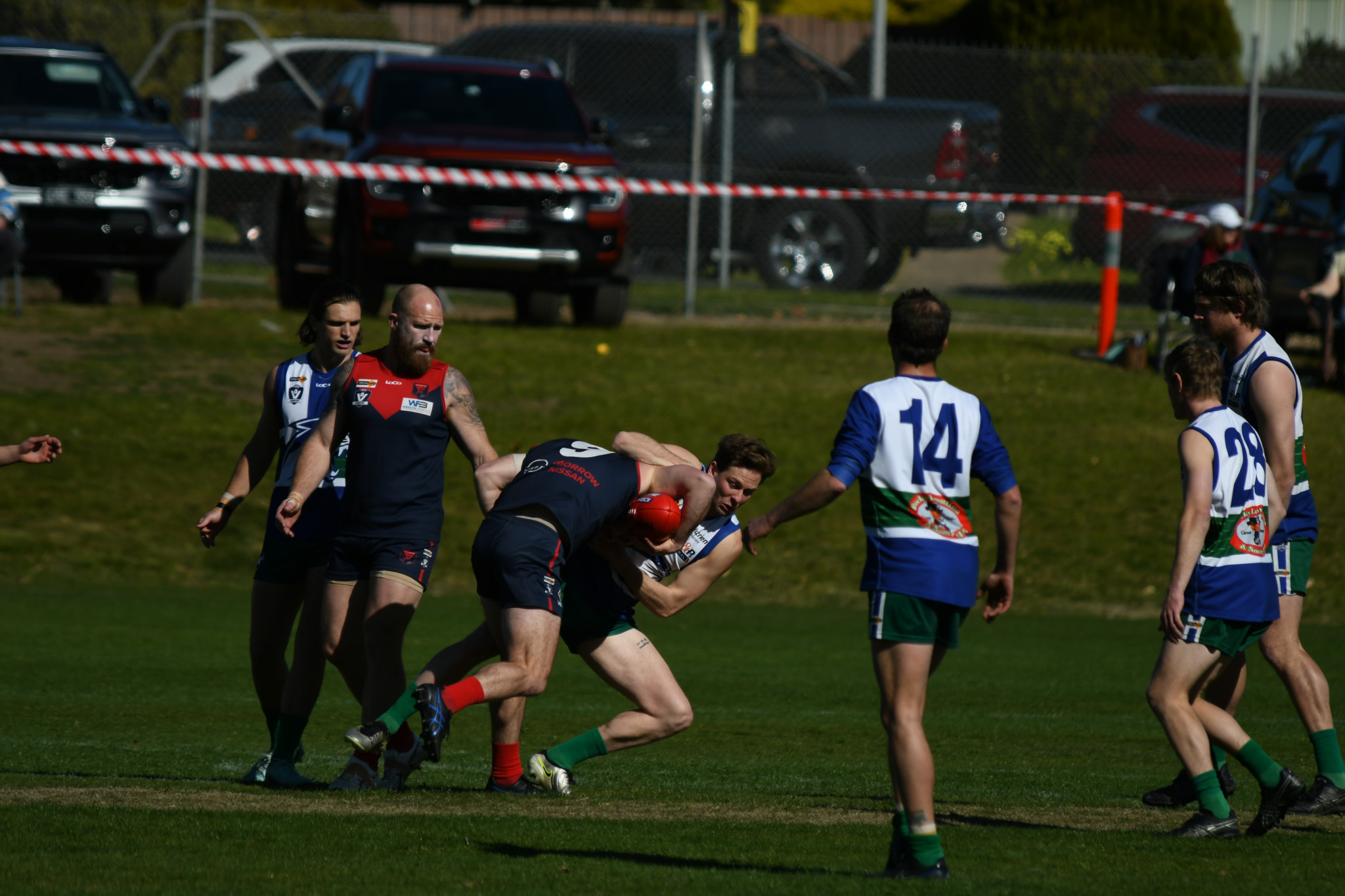 Robbie Miller tackles Josh Clayton.
