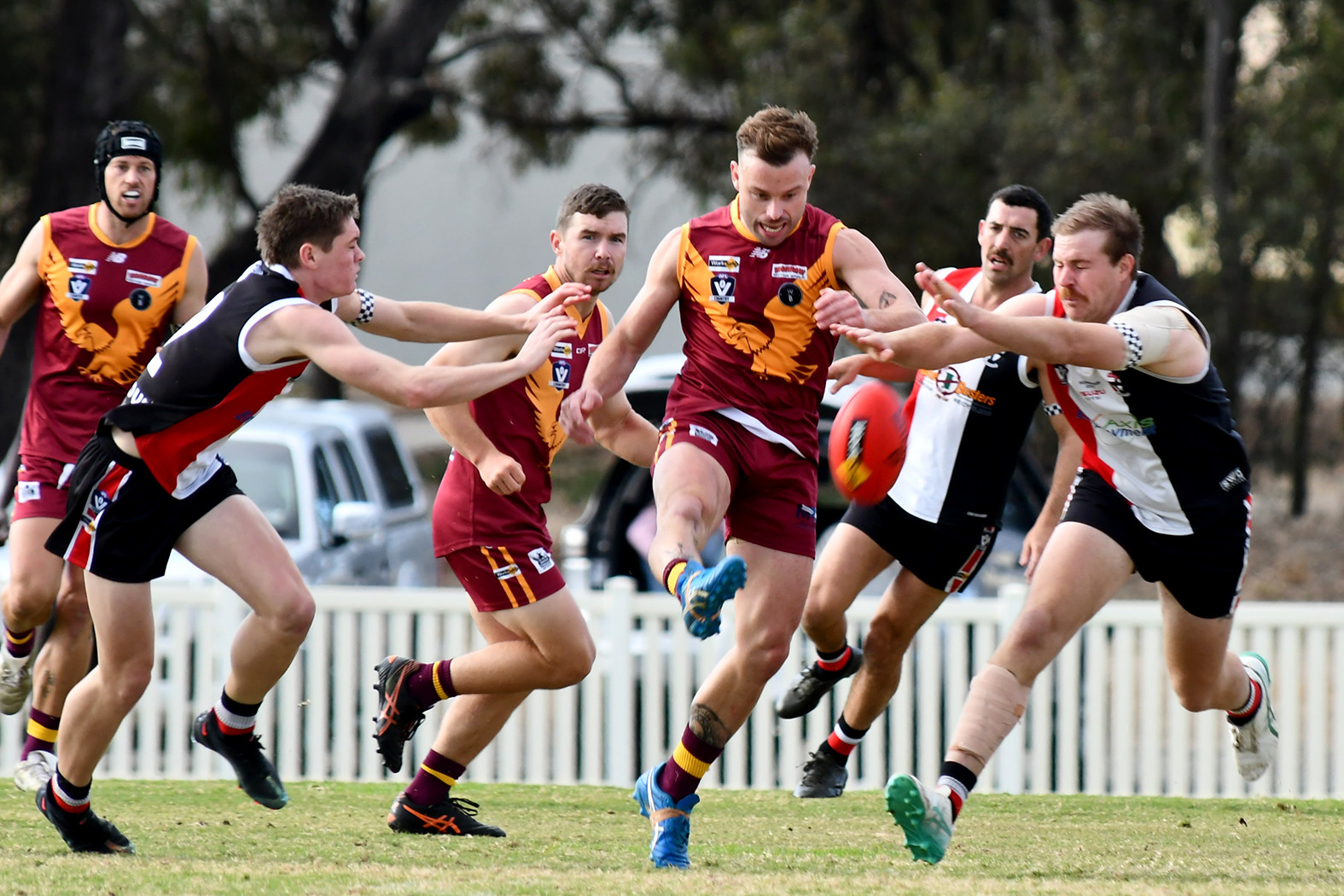 Warrack Eagles midfielder Ben Hanna kicks his team forward on Saturday.