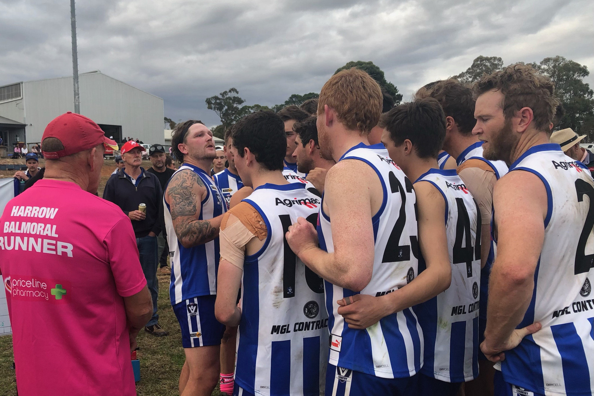 Harrow Balmoral coach Jai Thompson addressing his troops at three quarter time.