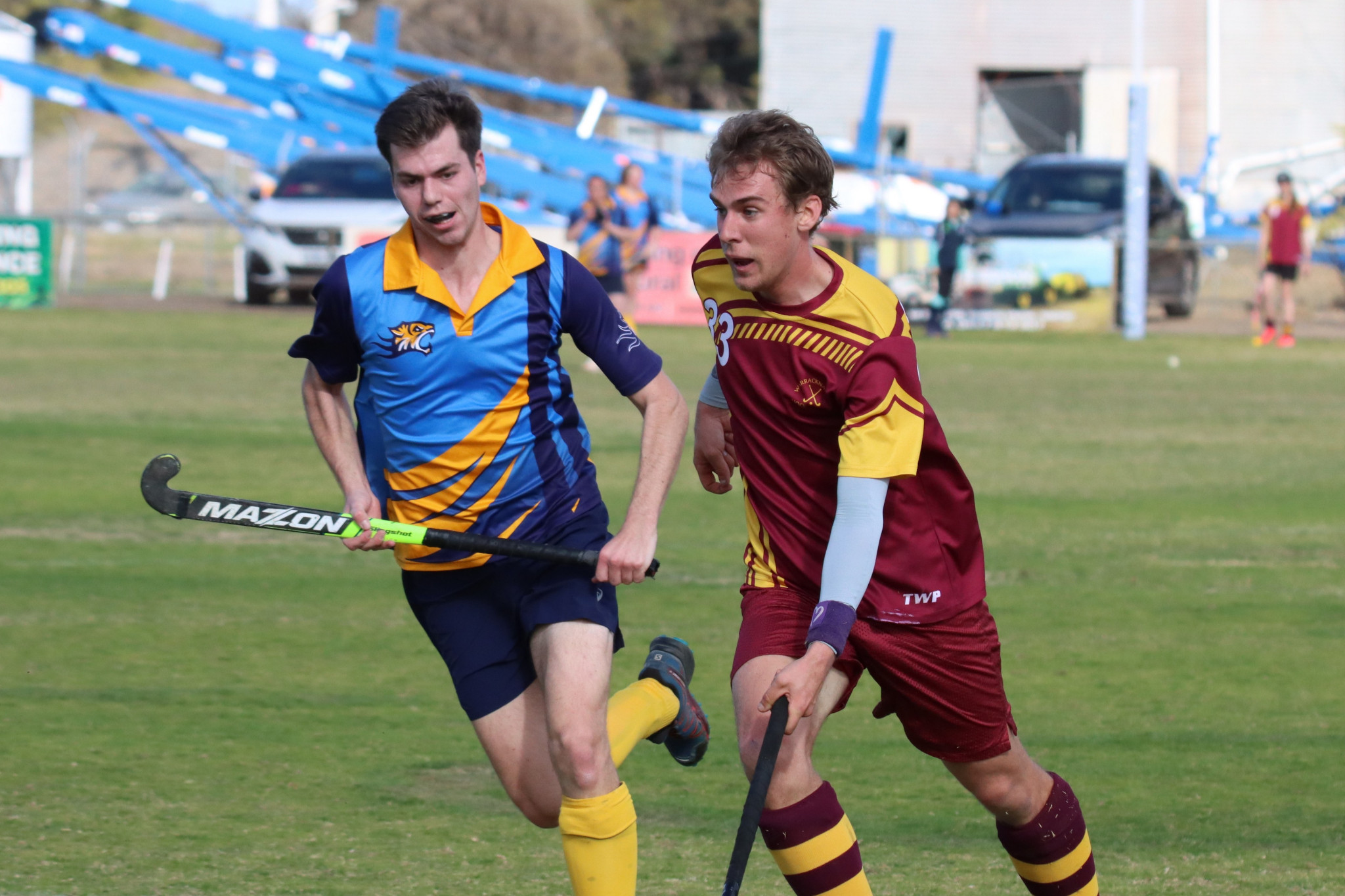 Sandon Schultz runs with the ball while assessing his options before Nhill’s Jason Reichelt can lay a tackle.