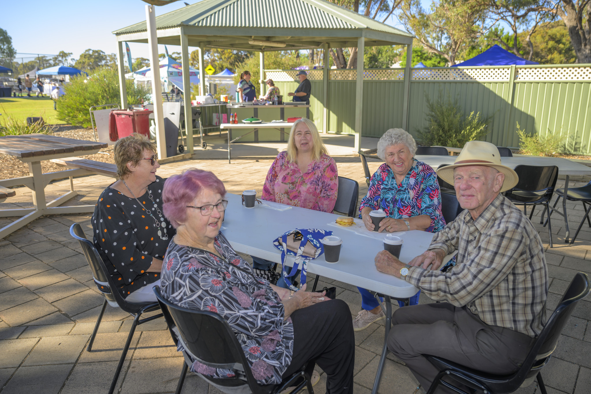 Val McDonald, Susan Kallergis, Lyn Weidemann, Kevin Fisher and Dulcie Fisher at the Haven market. Photo: ROBIN WEBB