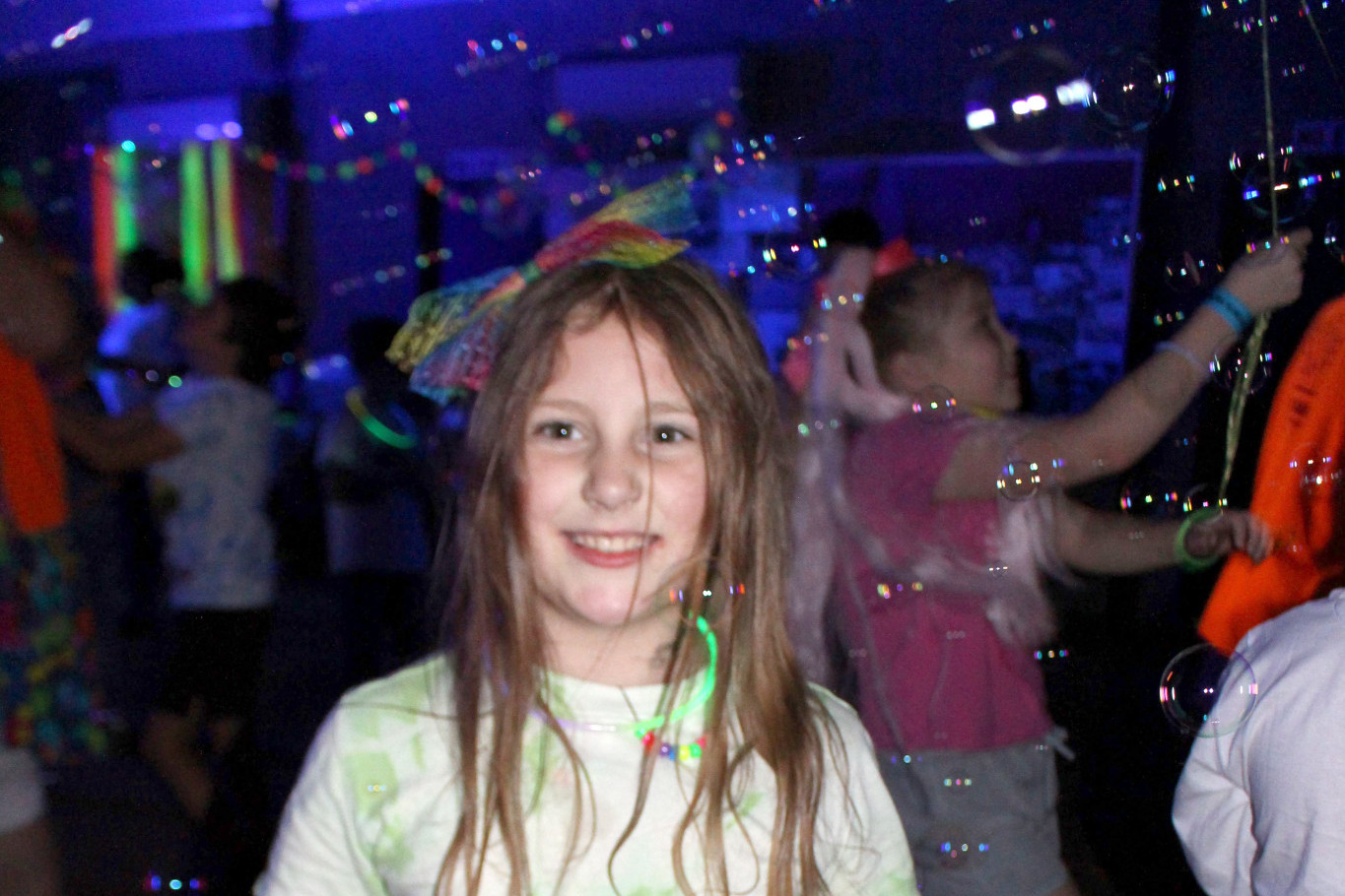 Addelaide H. dressed in rainbow colours for the disco.
