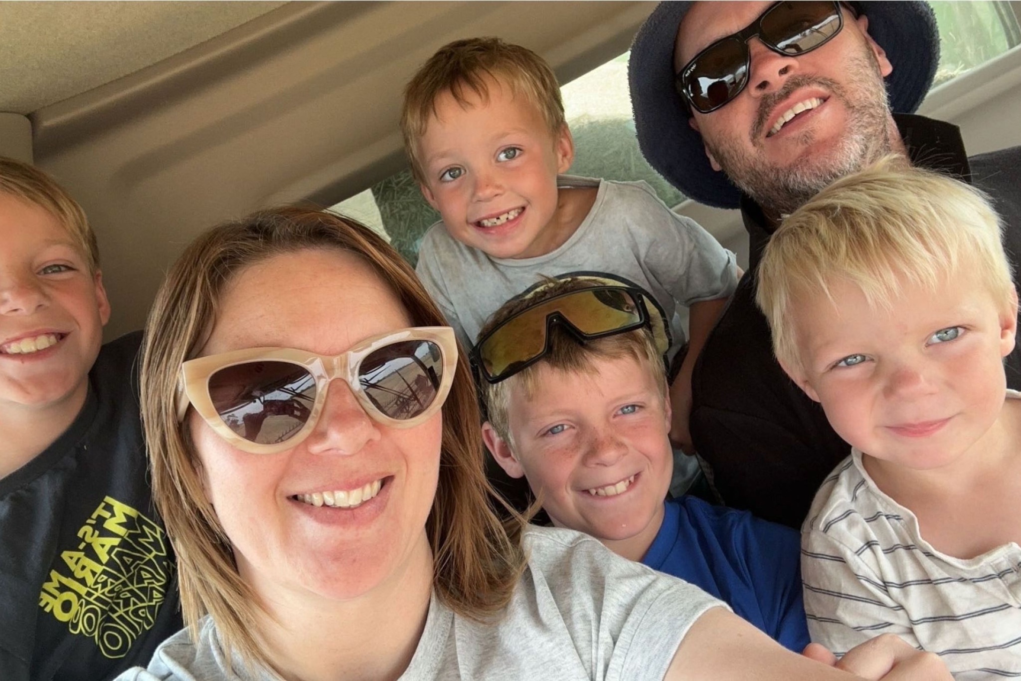 A newspaper cutting of the familyFaces of farming. Sammy, Sarah, Tommy, Joey, Benny and David Byrne in their annual family photo in the harvester. with 3-year-old David Byrne who is following in his father's footsteps and is now fighting to keep the family farm
