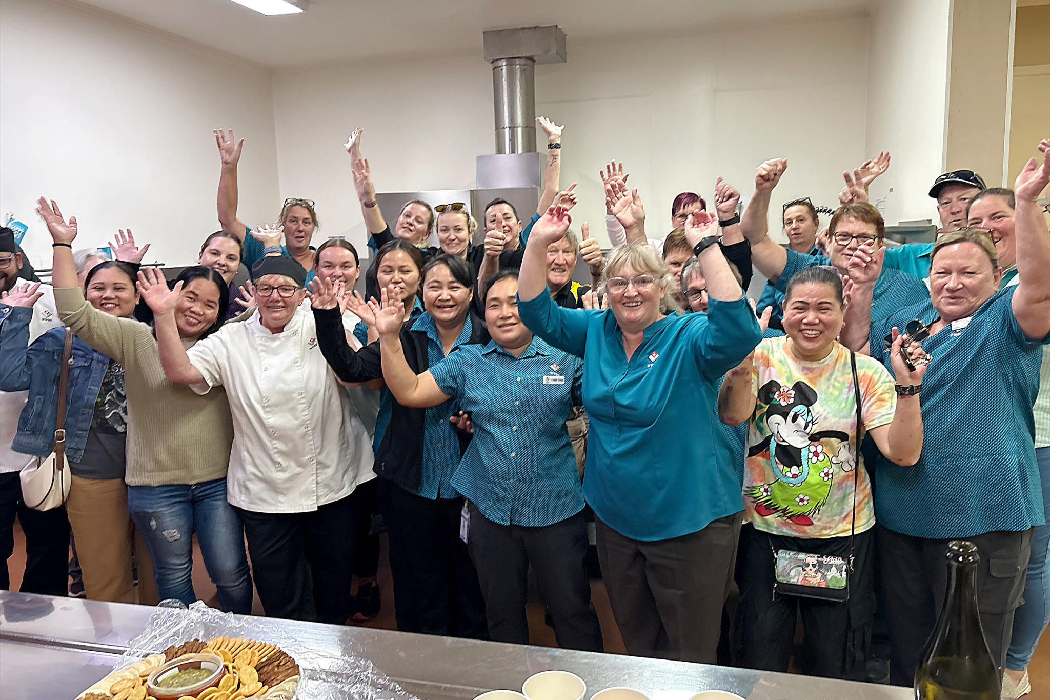 Nhill kitchen and general staff gather to farewell the old kitchen before renovations begin.