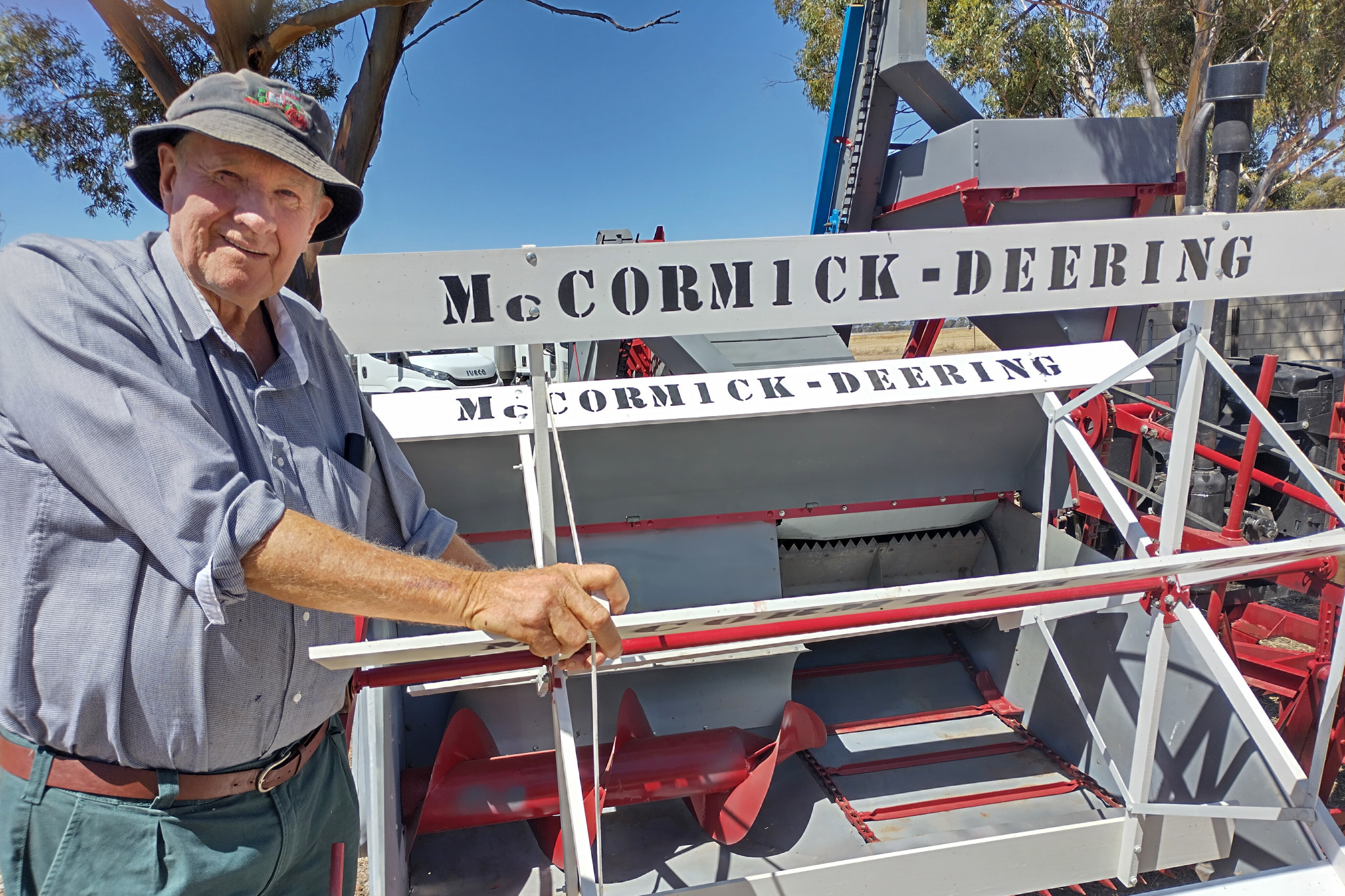 Kalkee farmer Gordon Mills shows the US-made McCormick-Deering combine harvester he owns with Dave Williams of Nhill, believed to be the sole one imported to Australia. CREDIT Faye Smith