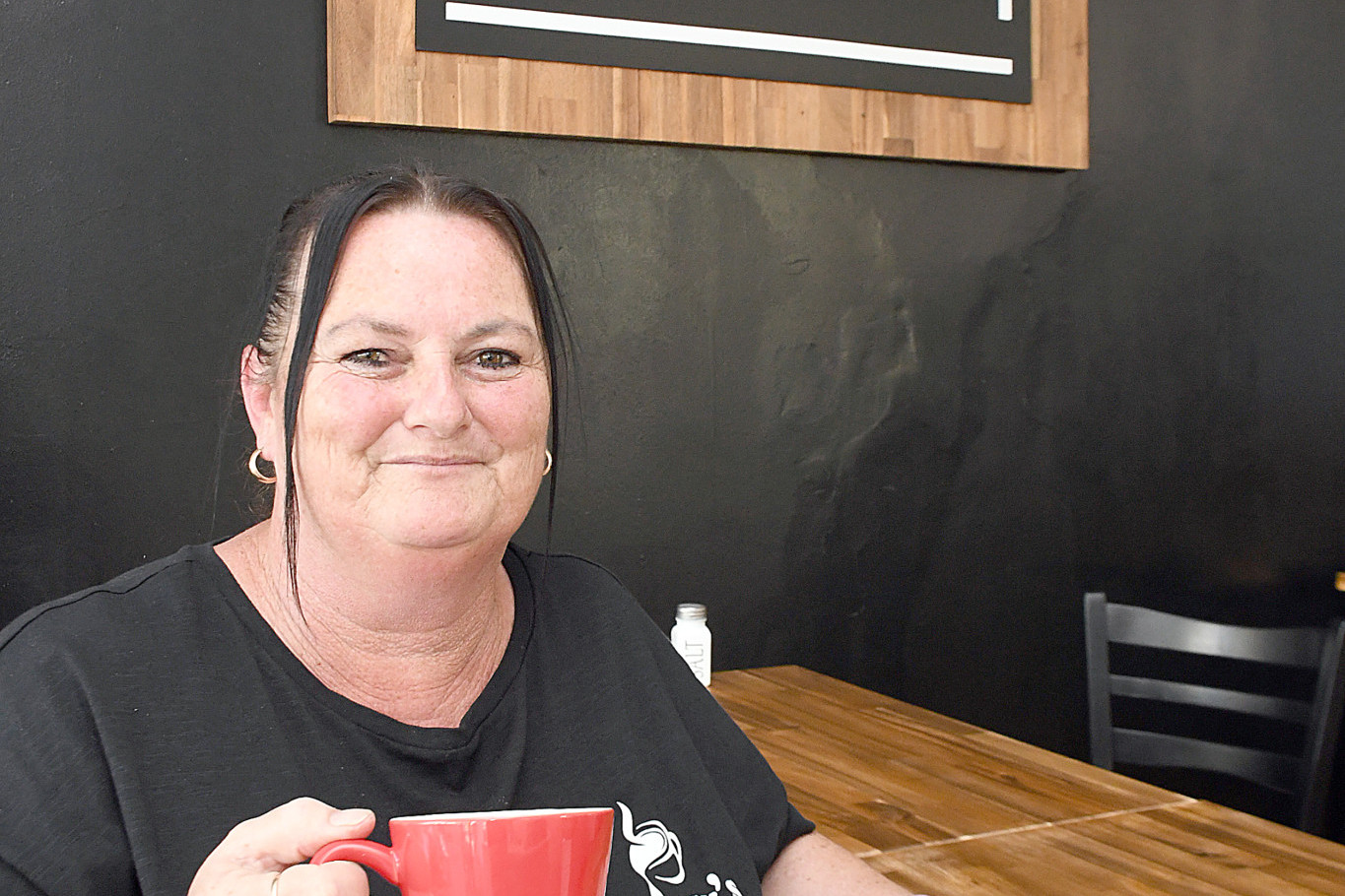 Just like her customers, Christine Little stops for a quick coffee and a rest after a busy day in her new cafe venture Chrissy’s Cafe in Murtoa this week.