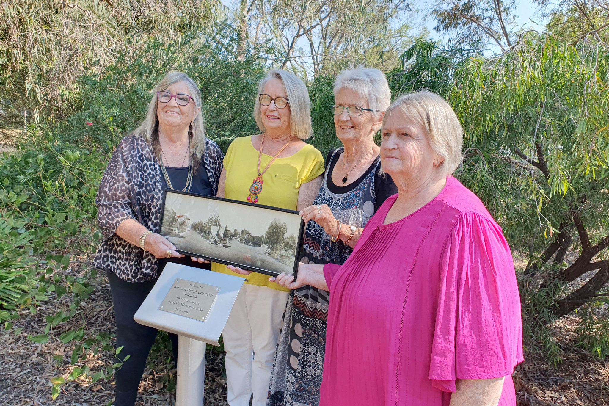 Mr and Mrs Shorter's granddaughters, Glynnice Fraser, Barbara McLean, Julie McLean and Meryl Bullock, gather at Anzac Park to unveil a plaque to recognise their grandfather's service.