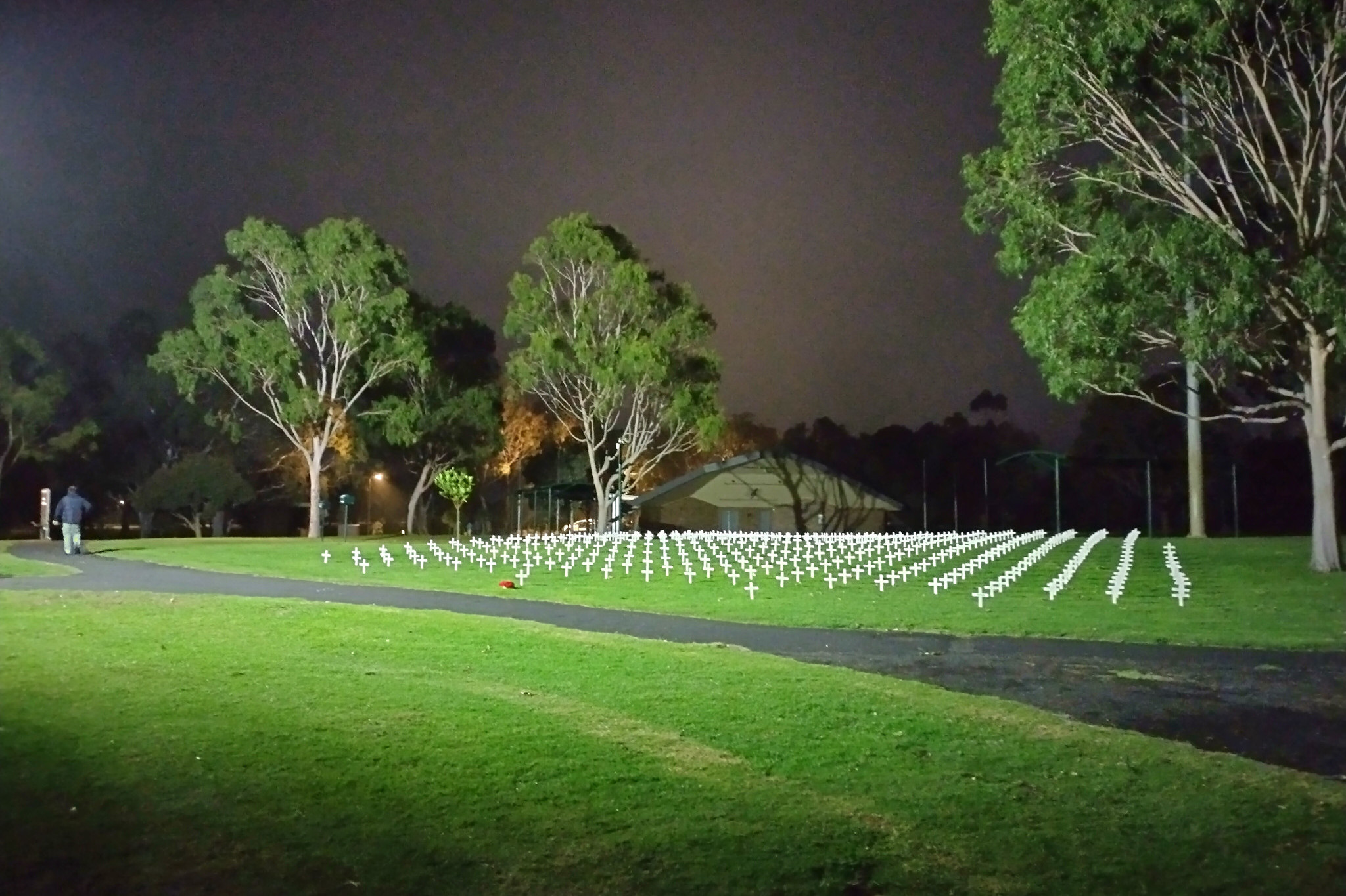1 In the morning darkness, lights in Sawyer Park shine down on more than 500 crosses, each representing a Horsham person who died in a war.