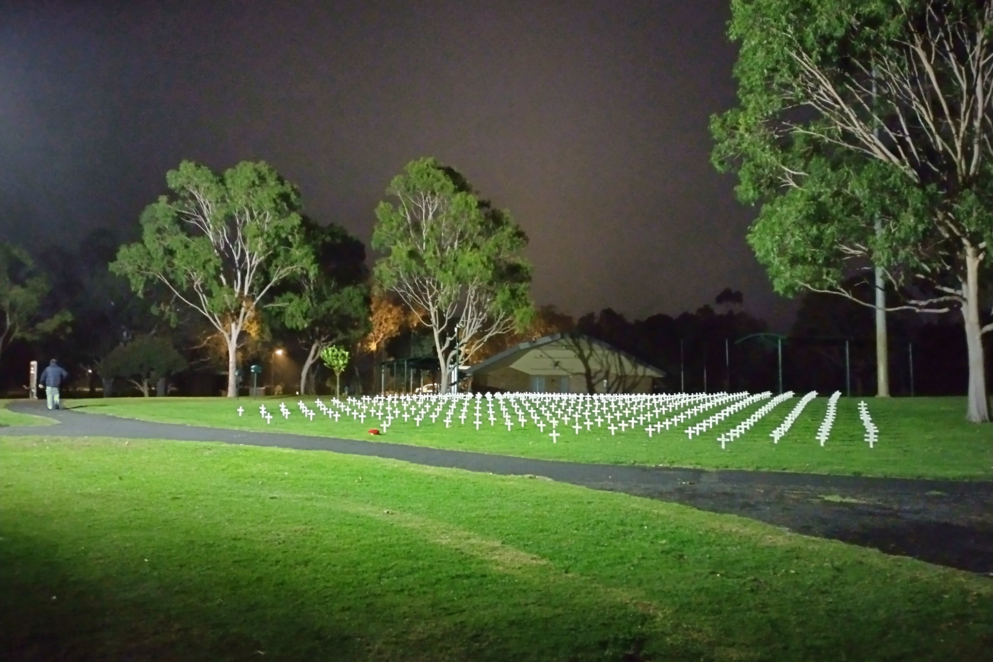 1 In the morning darkness, lights in Sawyer Park shine down on more than 500 crosses, each representing a Horsham person who died in a war.