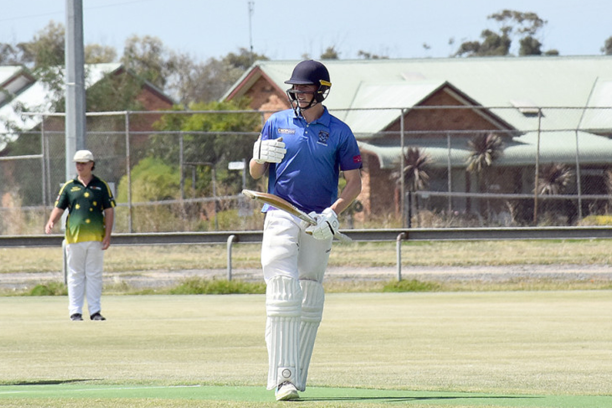 Connor Weidemann looks to the stands after reaching his century for Panthers in B Grade.