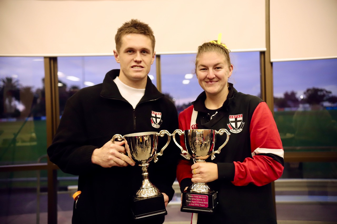 Saints footballer Gage Wright and netballer Ashlee Grace with the trophies. PHOTO: GABI POWELL