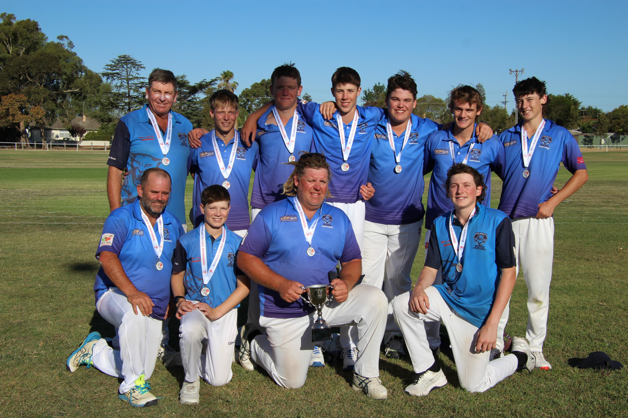 2025 premiers featuring three sets of father-sons and two brothers: Back Row L-R: Leigh Funcke, Seth Talbot, Ryder Hudson, Jake McKenzie, Anthony McCurdy, Wilson Mitchell, Jarvis Mitchell. Front Row L-R: Scott McCurdy, Hugh Weidemann, Brent Hudson, Hugo Funcke.