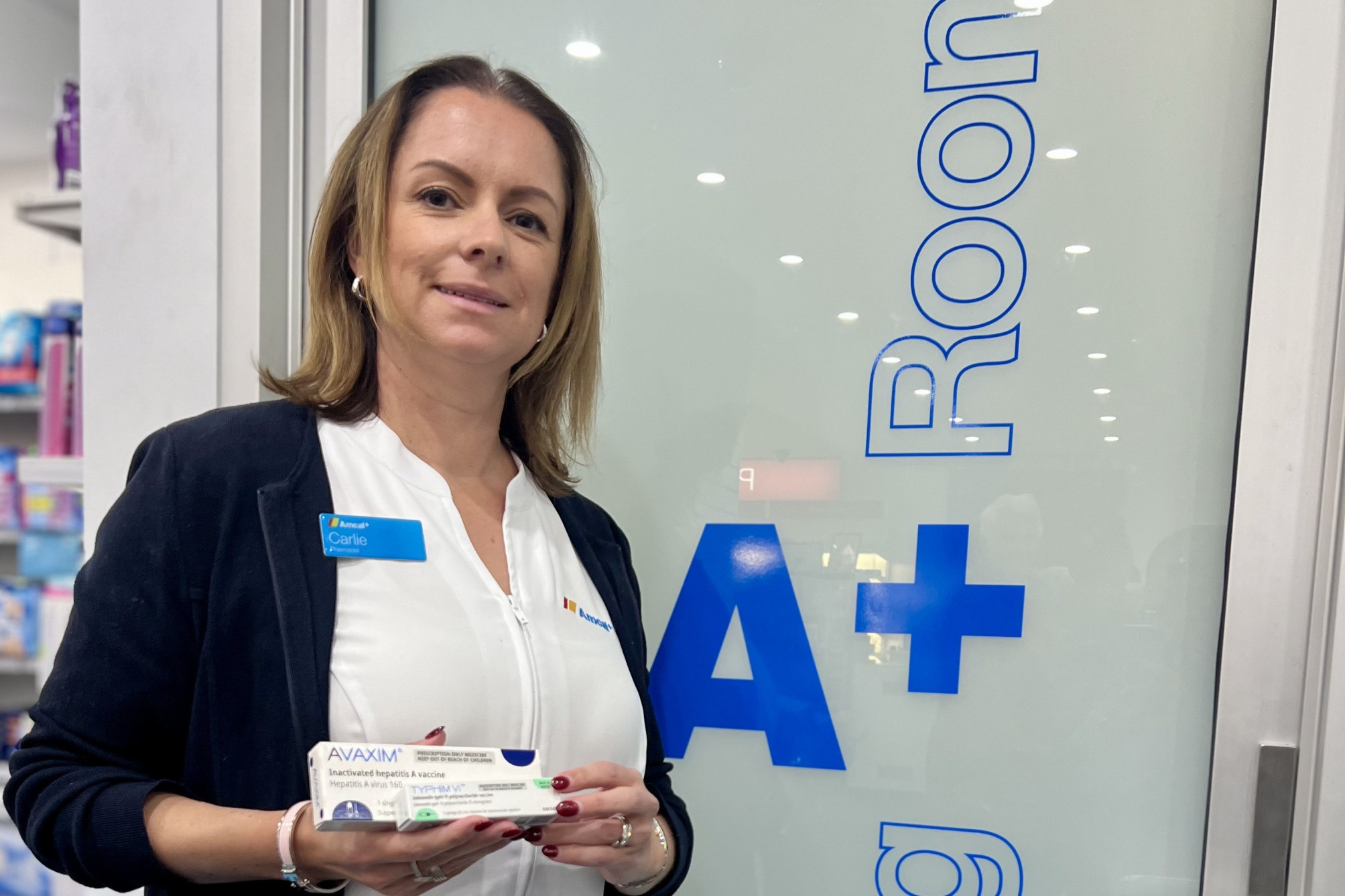 Pharmacist Carlie Streeter pictured with a travel vaccine, which is a part of the expanded pharmacy services across the Wimmera. Photo: TAYYAAB MASROOR