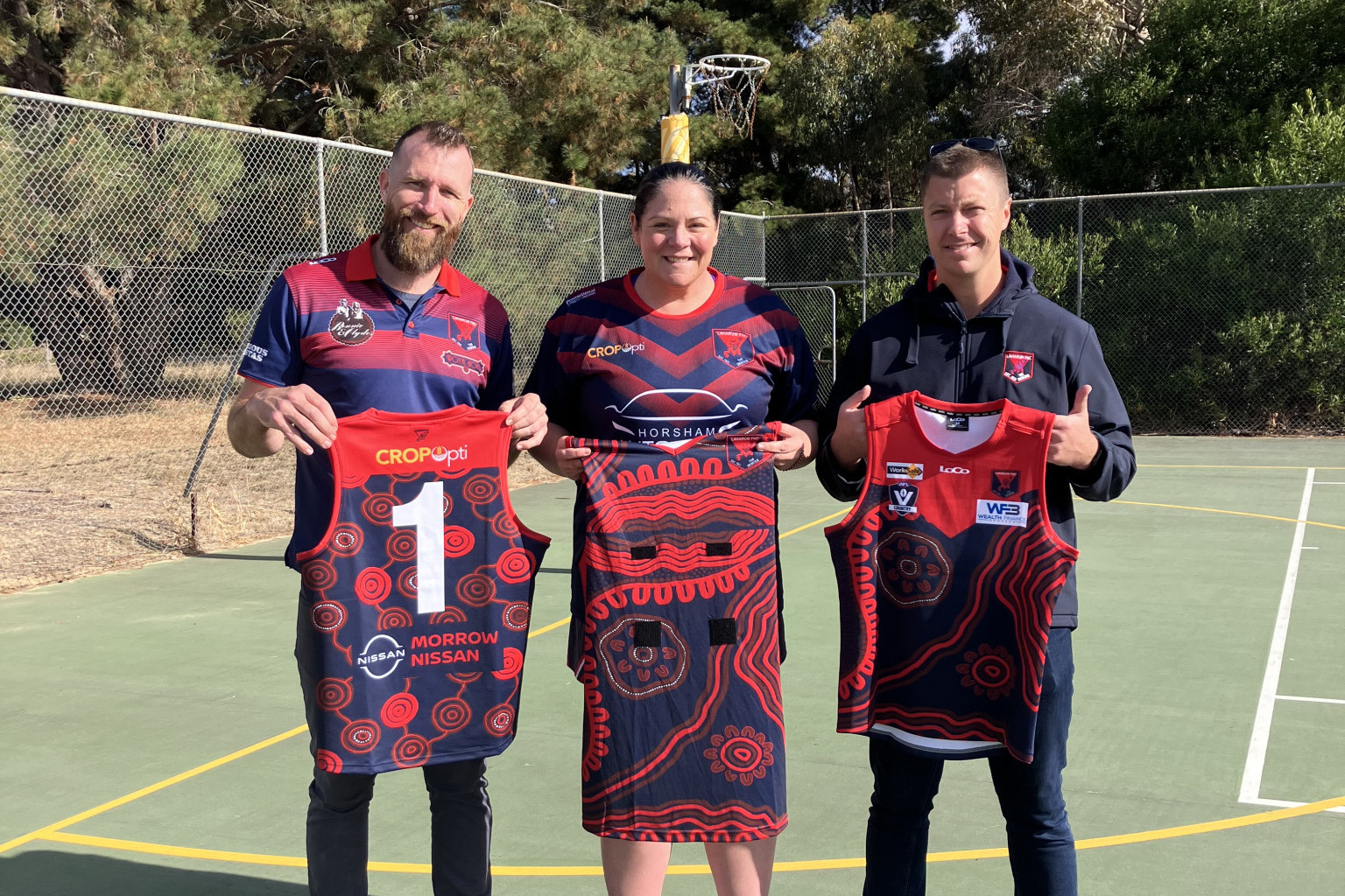 Laharum key figures with the playing apparel. Shannon Argall (joint coach of the senior football team), Rebecca McIntyre, (Coach of the A and B grade Netball) and Hamish Roberts (Playing President of LFNC). PHOTO: LFNC