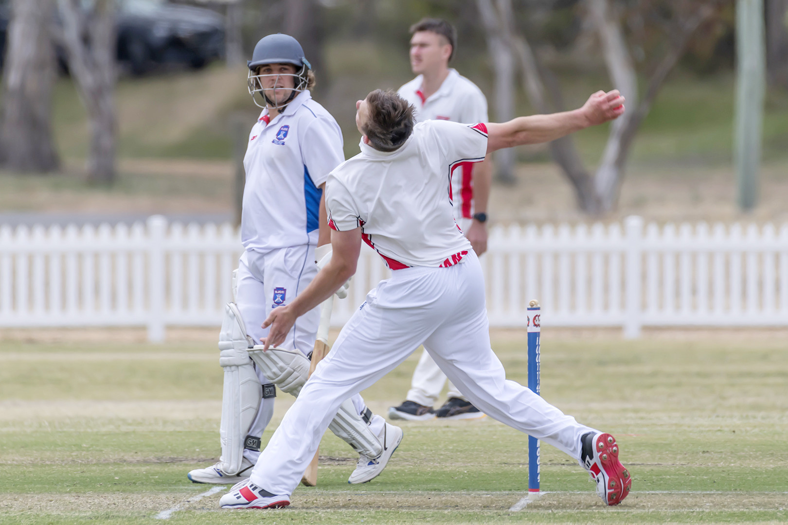 James Paley bowling for Birchip with Donald Jeffcott's Cooper Anderson at the non-strikers end.