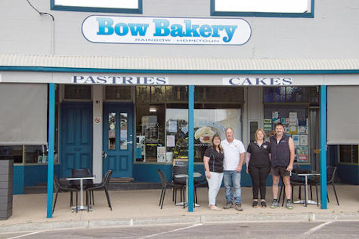 Jacinta, Stuart, Caroline and Mark Cocks out the front of the Rainbow store. Photo: ALISON EY