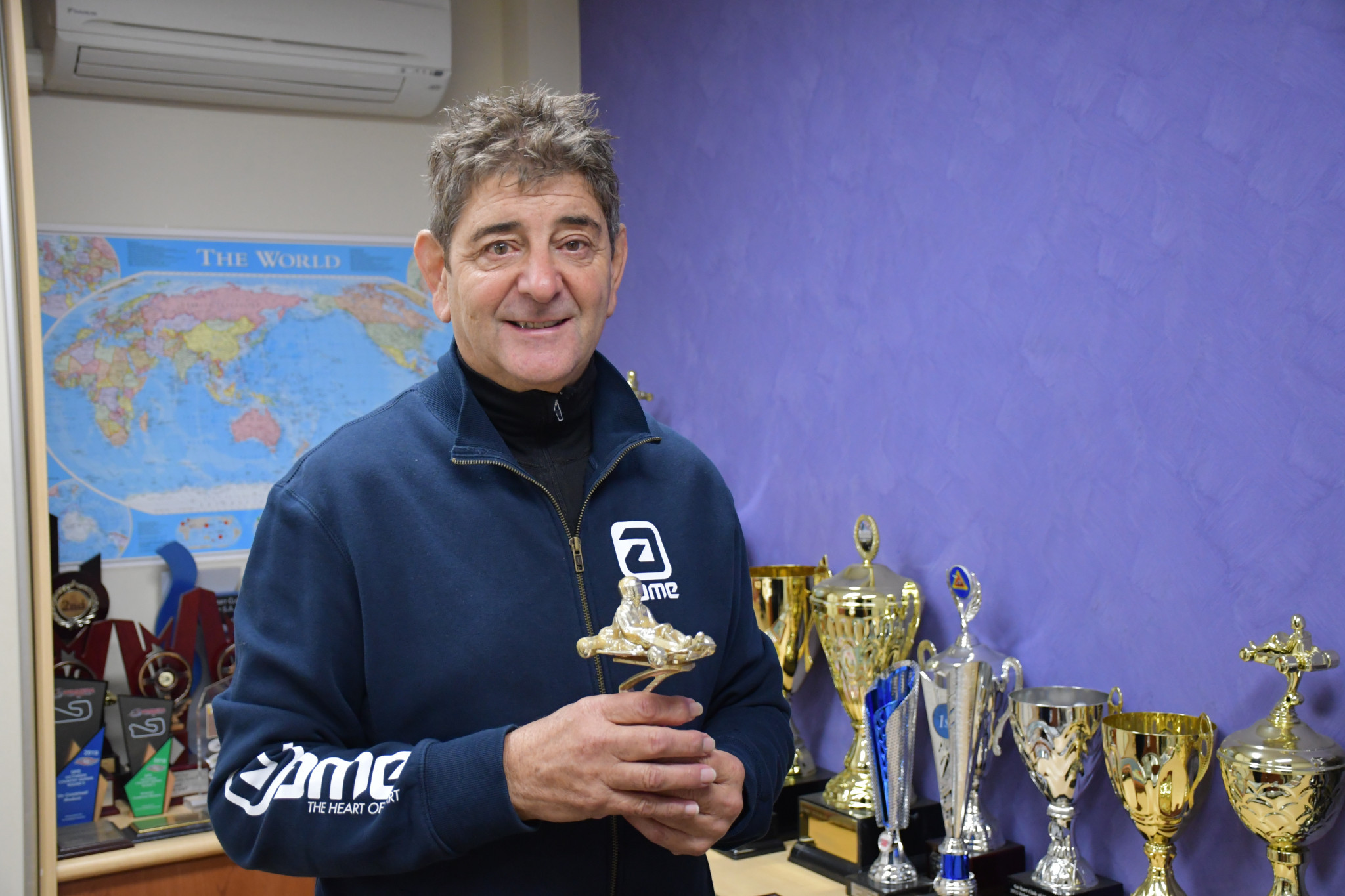 Remo Luciani pictured with few of his trophies in his office. PHOTO: TAYYAAB MASROOR