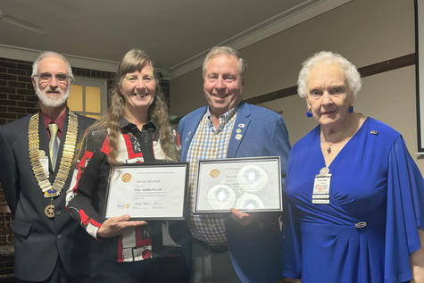 Jenny and Doug Mitchell (centre) are recognised as Paul Harris Fellows by Rotary Club of Horsham's outgoing president Michael Speirs (left) and new president Loloma Puls (right).