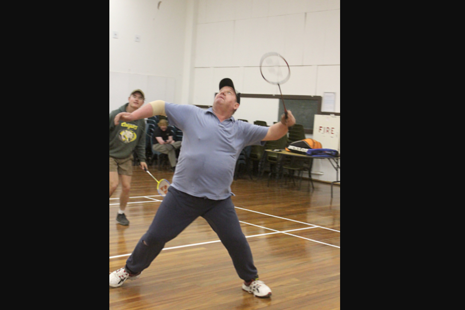 Creamy Soda's Fred Saul lines up a smash during his double match.