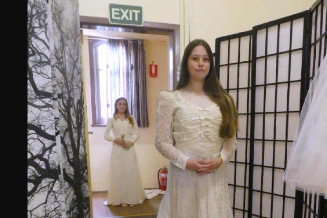 Sister Annieka (front) in Evelyn Blair's wedding dress, while Inara (behind) in 1942 Vera Borgelt gown.