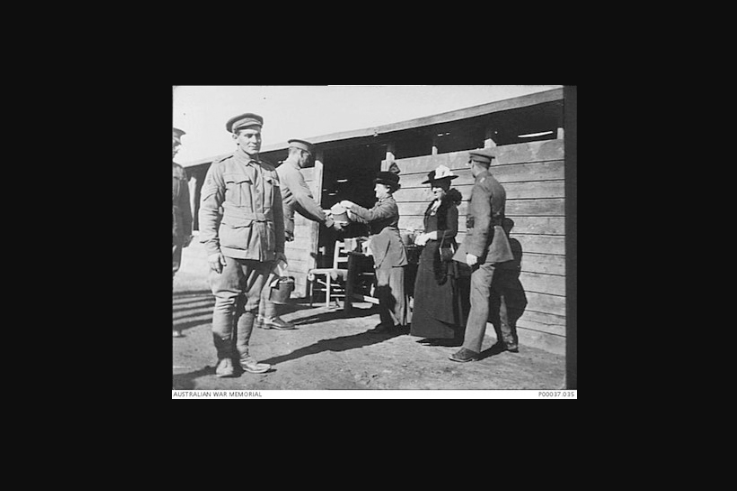 Women distribute Christmas billies to men in Cairo, Egypt, December 1915.
