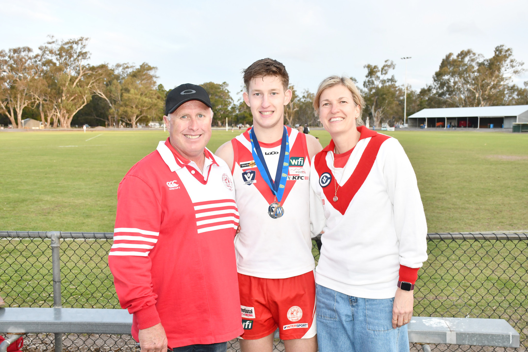 Henry with his dad, Tim and mother, Megan.