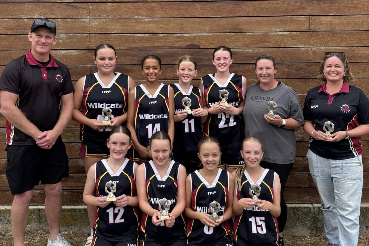 Warracknabeal Wildcats under-14 girls division two winners: Back Row L-R: Brad Krahe (Coach), Fergie Kennedy, Mia Roberts-Isabirye, Maddie Hicks, Aleah Elliott, Stacey Krahe (Coach), Jane Shannon (Team Manager). Front Row L-R: Harlow Krahe, Ivy Benton-Huebner, Pippa Shannon, Ella Preston.