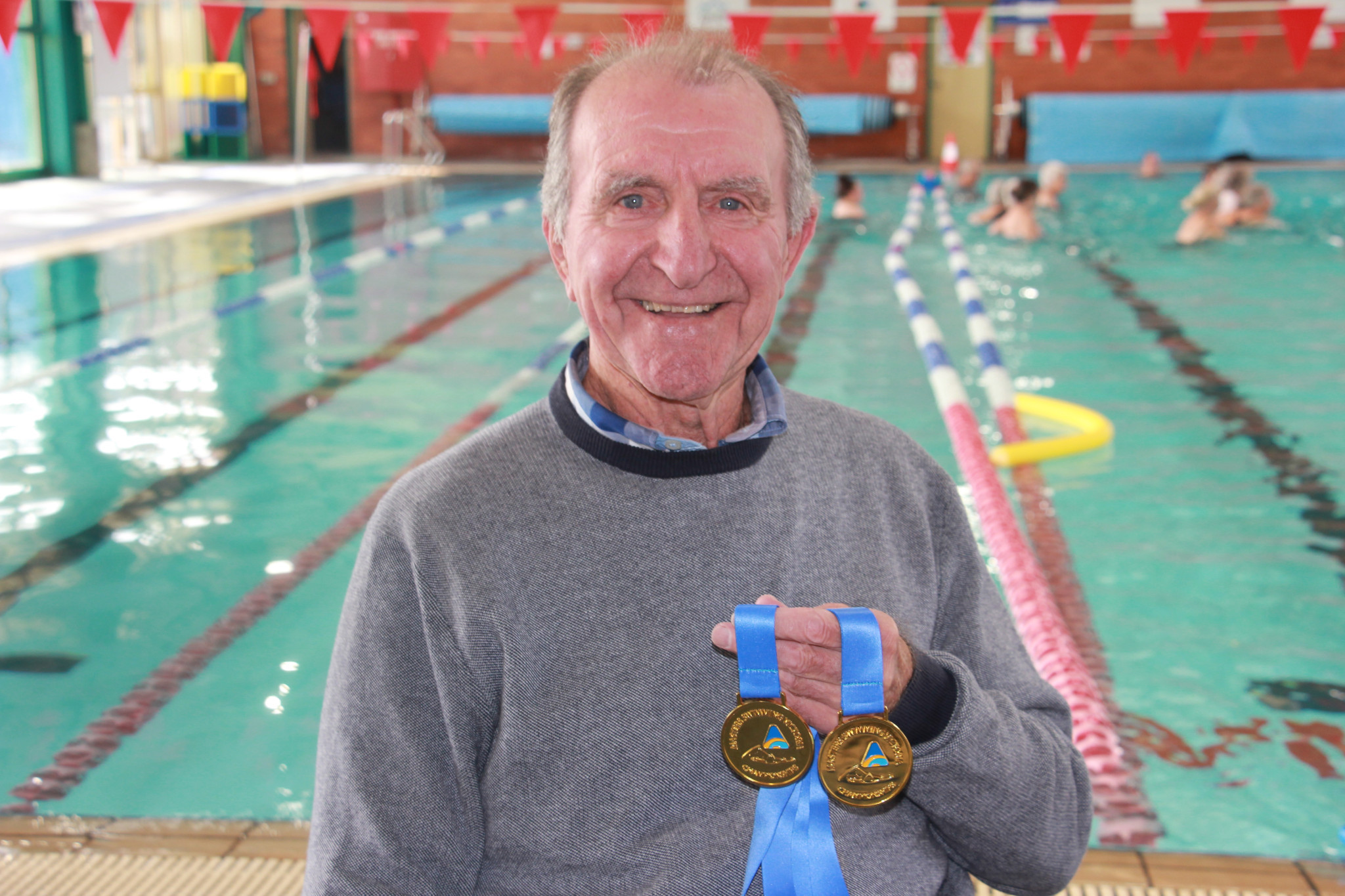 Wilf showing off his medals.