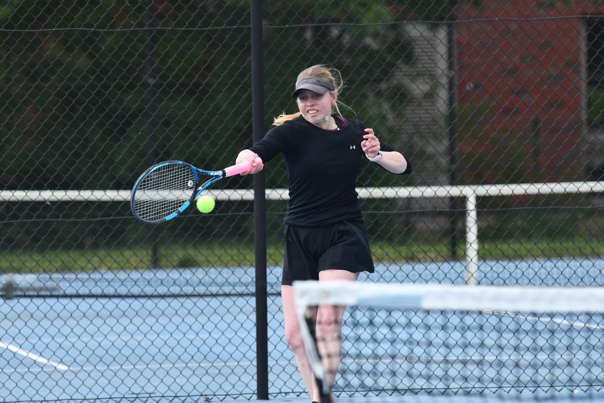 Central Park's Willow Sainsbury reaches for a return.