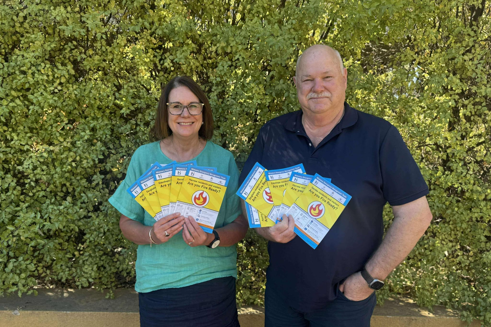 Wimmera Emergency Management Team’s project officer Sue Frankham and West Wimmera Shire Council’s municipal emergency management officer John Hutchins show off the Aspley, Dergholm, Edenhope, Goroke and Harrow fire ready guides.