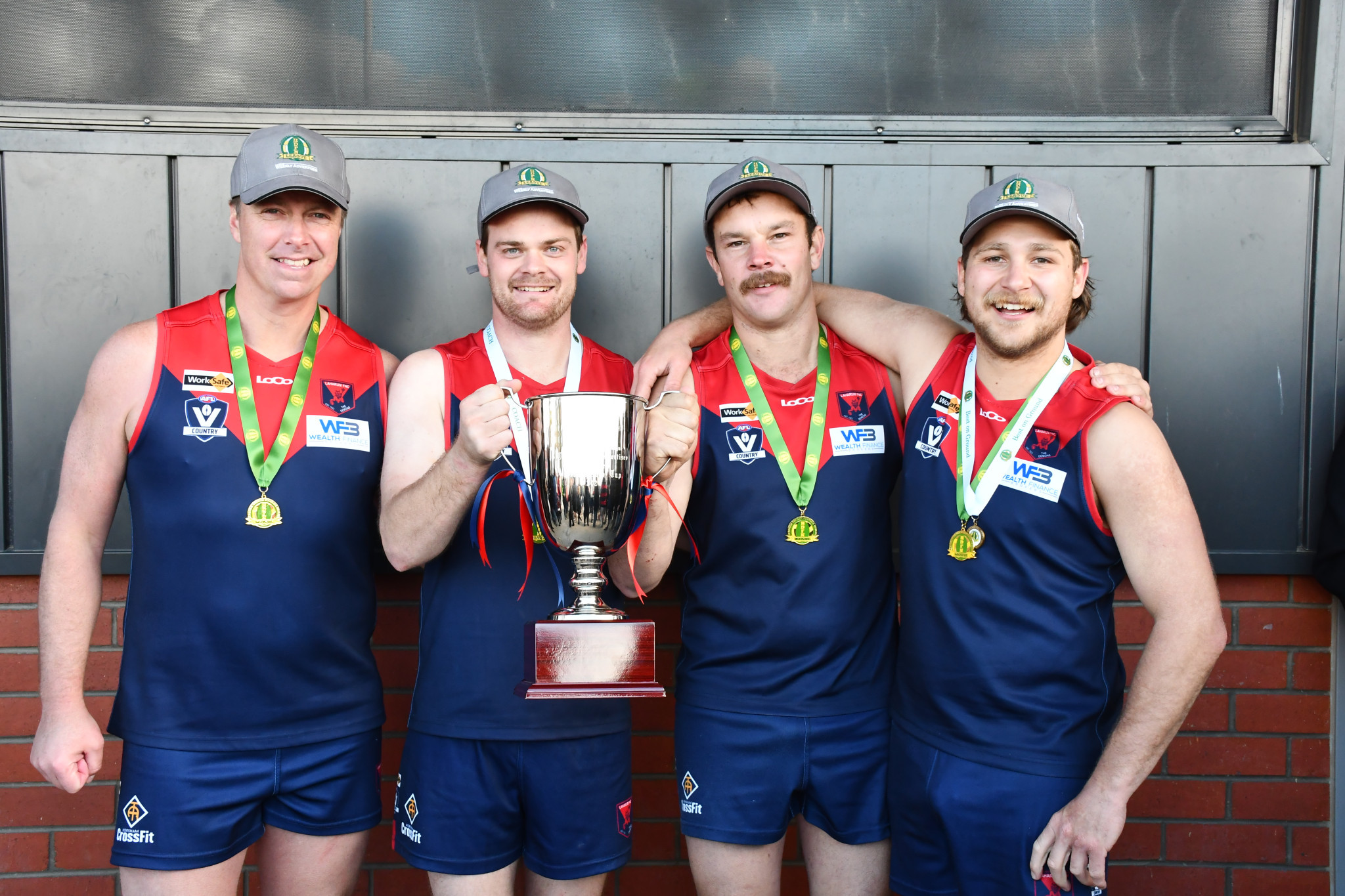 L-R: Laharum president Hamish Roberts, reserves coach Daniel Down, reserves captain Joel Pymer and best on the ground, Hayden De Graaf. PHOTO: CHRIS GRAETZ