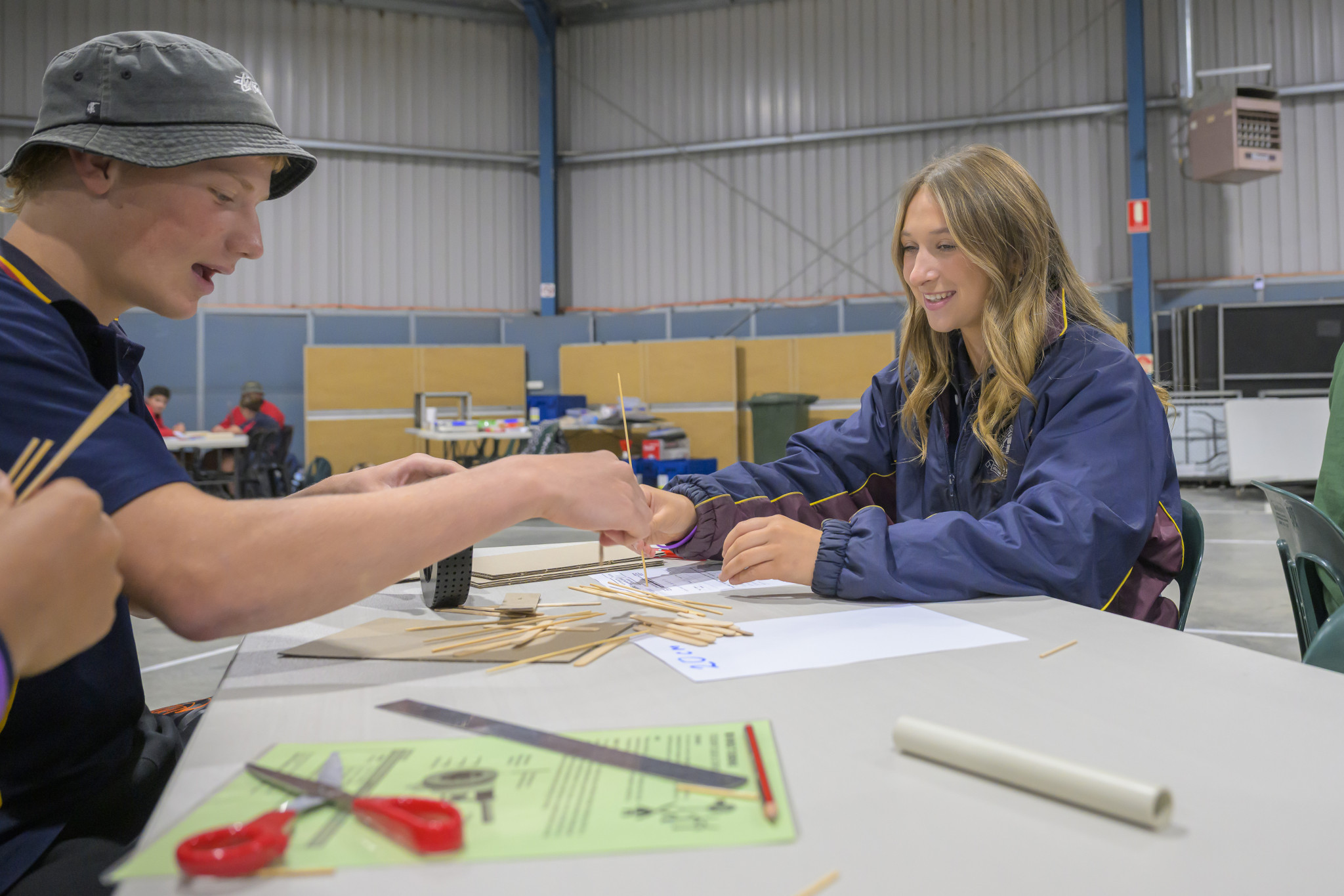 Hayden Bolack (left) and Harmoni Bell from Warracknabeal Secondary College, doing the wind turbine challenge.