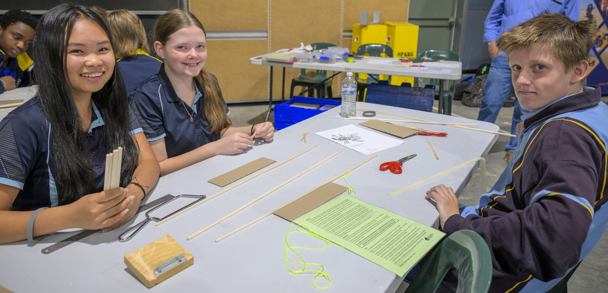 Holy Trinity College students doing the Bridge making challenge, Emmanuel Amilegbe, Noah Eilola and Toby Uebergang. Photo: ROBIN WEBB